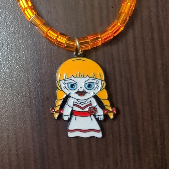 Halloween Orange beaded stretch bracelet with Annabelle Charm - Picture 3 of 4